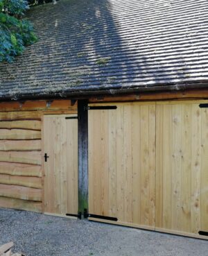 wooden garage doors to a domestic double garage